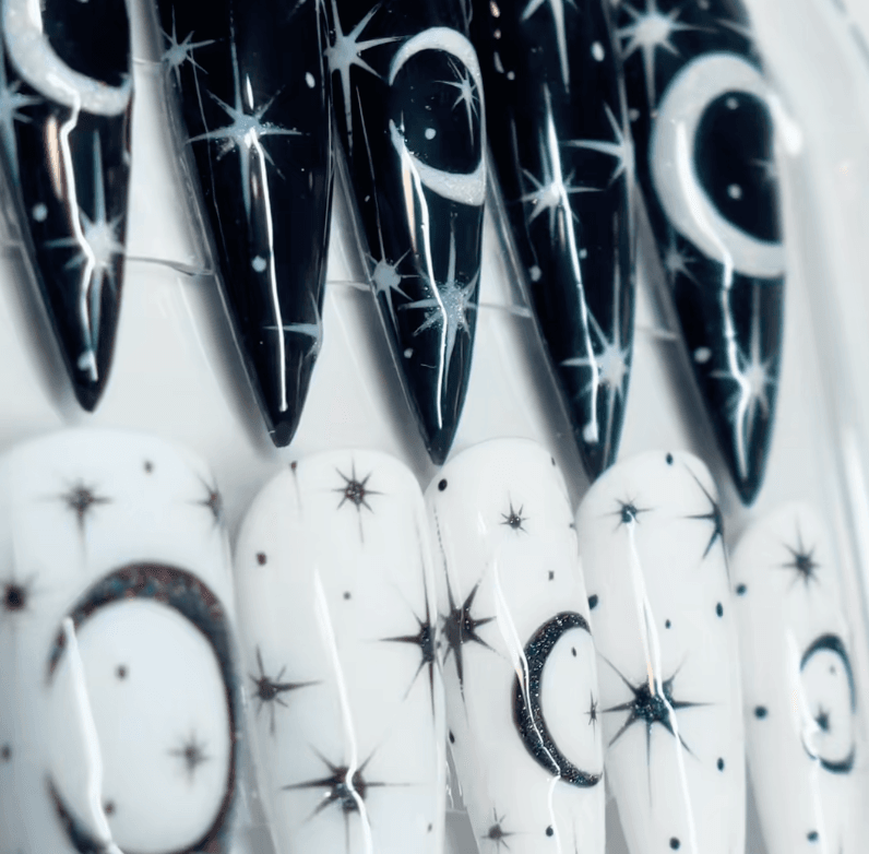 Black Stiletto Nails with Silver Moon Phases